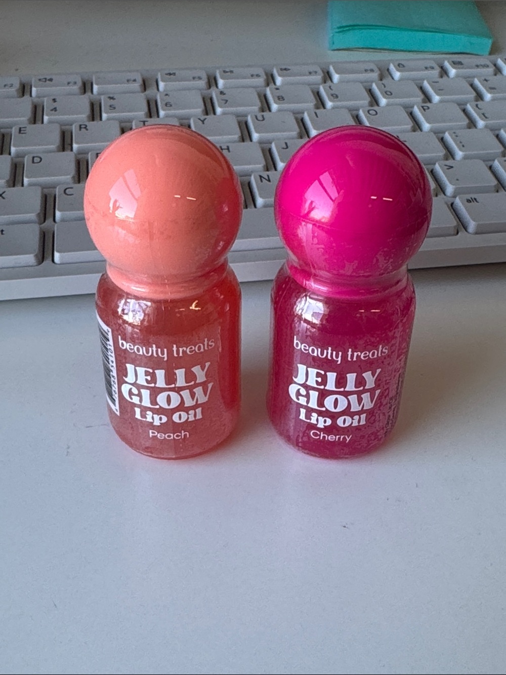Beauty Treats Jelly Glow Lip Oil — Peach (left) & Cherry (right) Shine